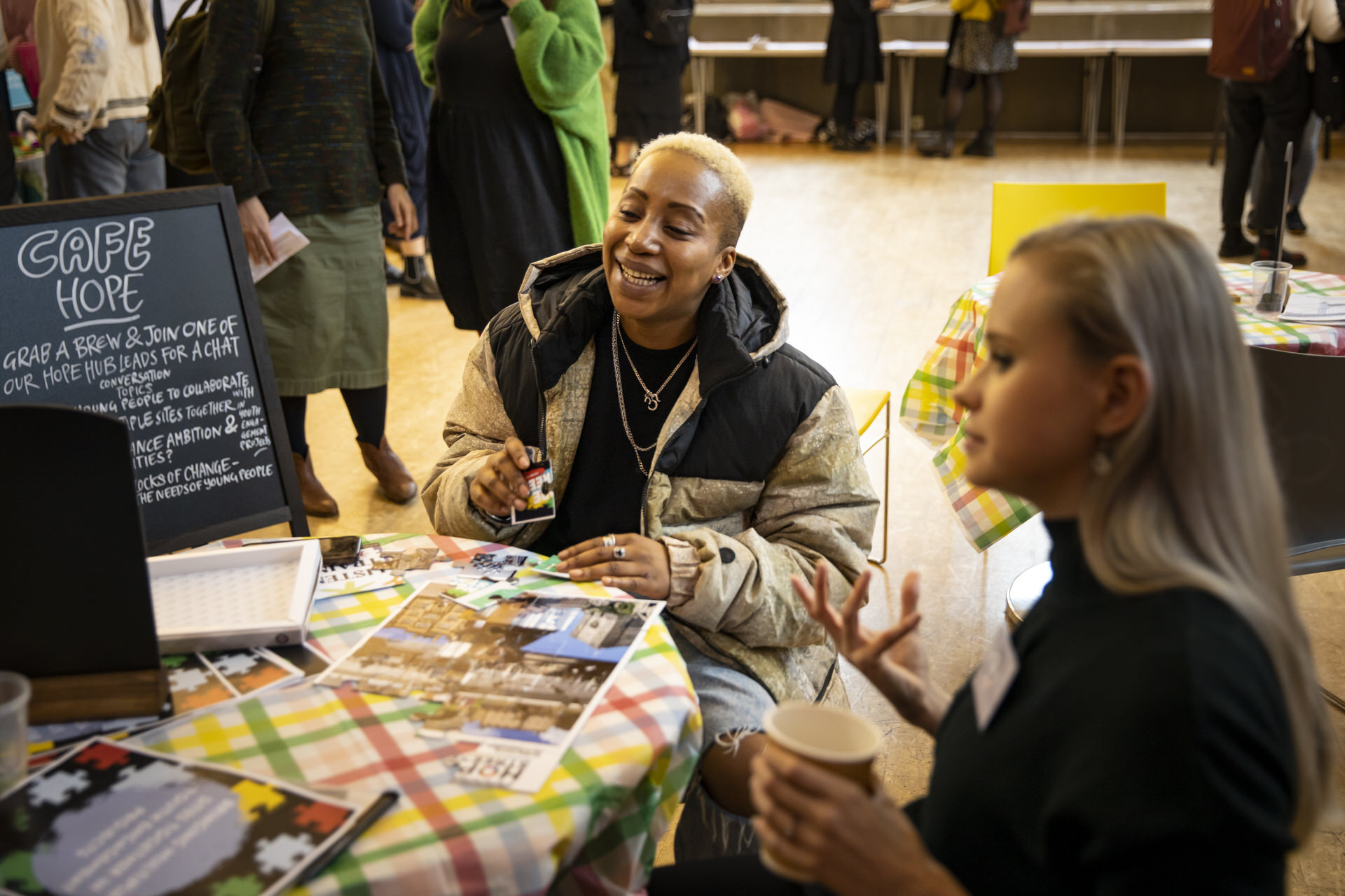 Young Producers relax and chat with each other at the Hope Evolves insight sharing conference, held in 2022.